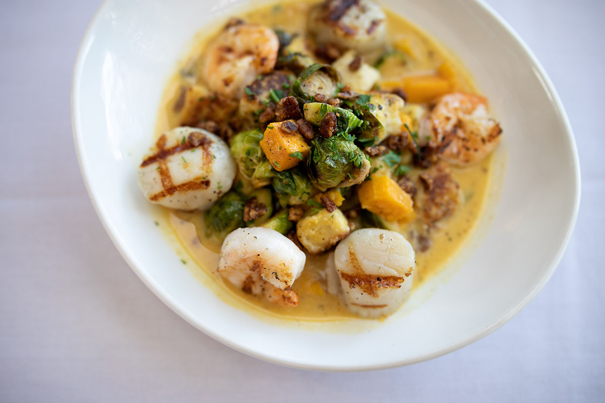Visit our Chattanooga restaurant and try our seasonal dishes before they're gone! This Grilled Shrimp & Scallops Gnocchi is a must not miss seasonal menu item!